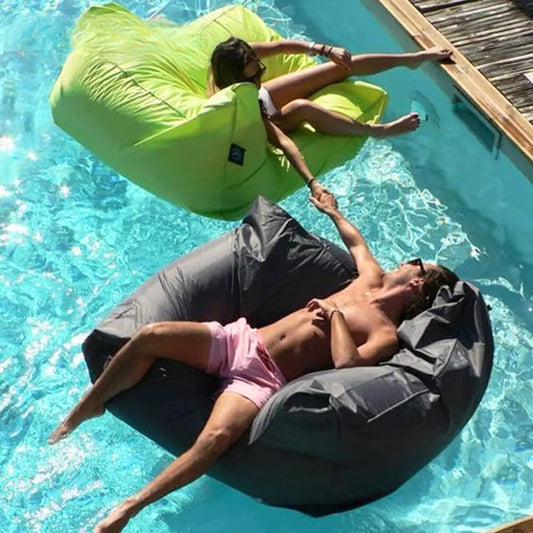 Bondi Premium Pool floating pool beanbag covers โ Lime Green and Dark Grey, couple relaxing together in the pool on matching floating loungers