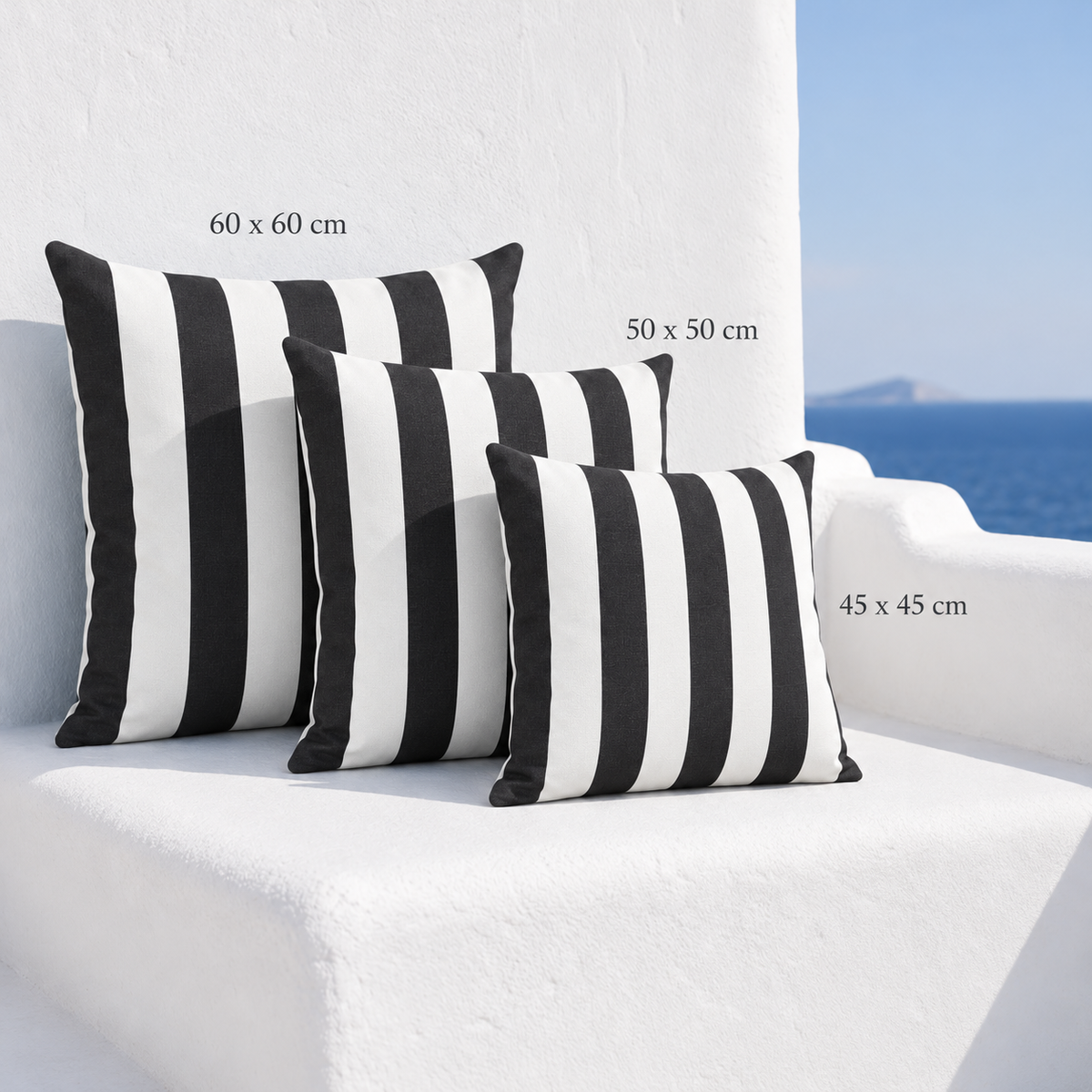 Three black and white striped Chill outdoor cushion covers showing the 45 x 45 cm, 50 x 50 cm and 60 x 60 cm square sizes.