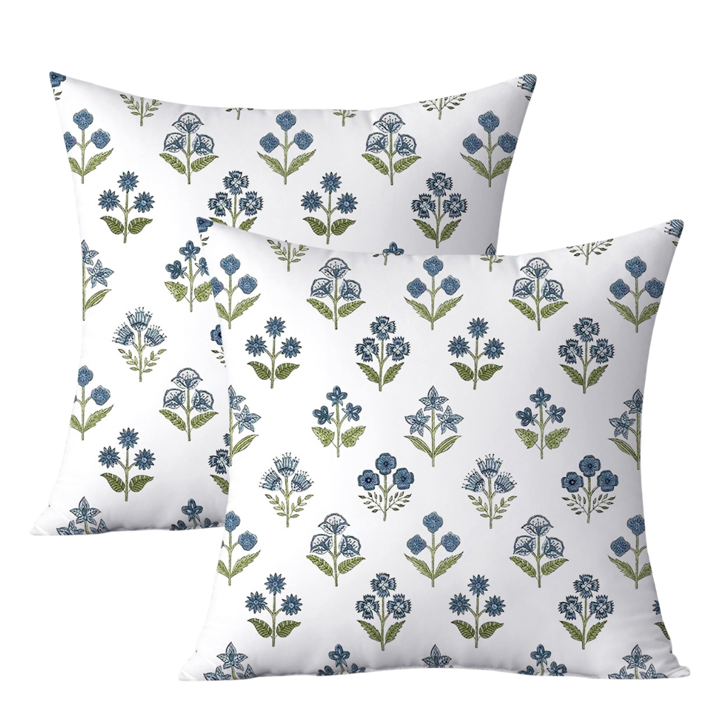 Set of two water-resistant Fleur blue floral outdoor cushion covers with blue flowers and green foliage on a white background