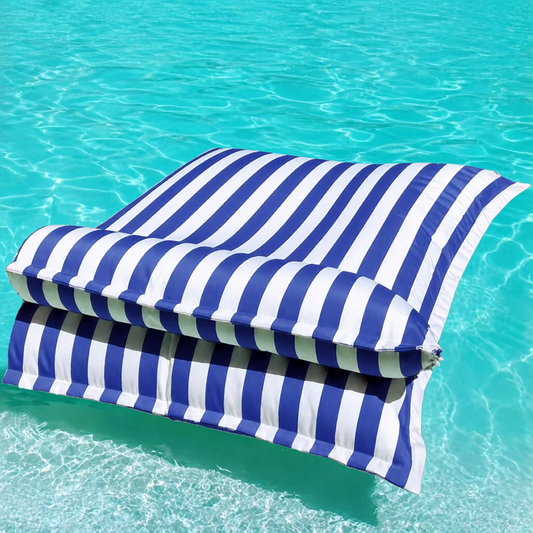 White and blue striped Big Bertha Premium Double floating beanbag lounger cover in a swimming pool, 140 x 180 cm