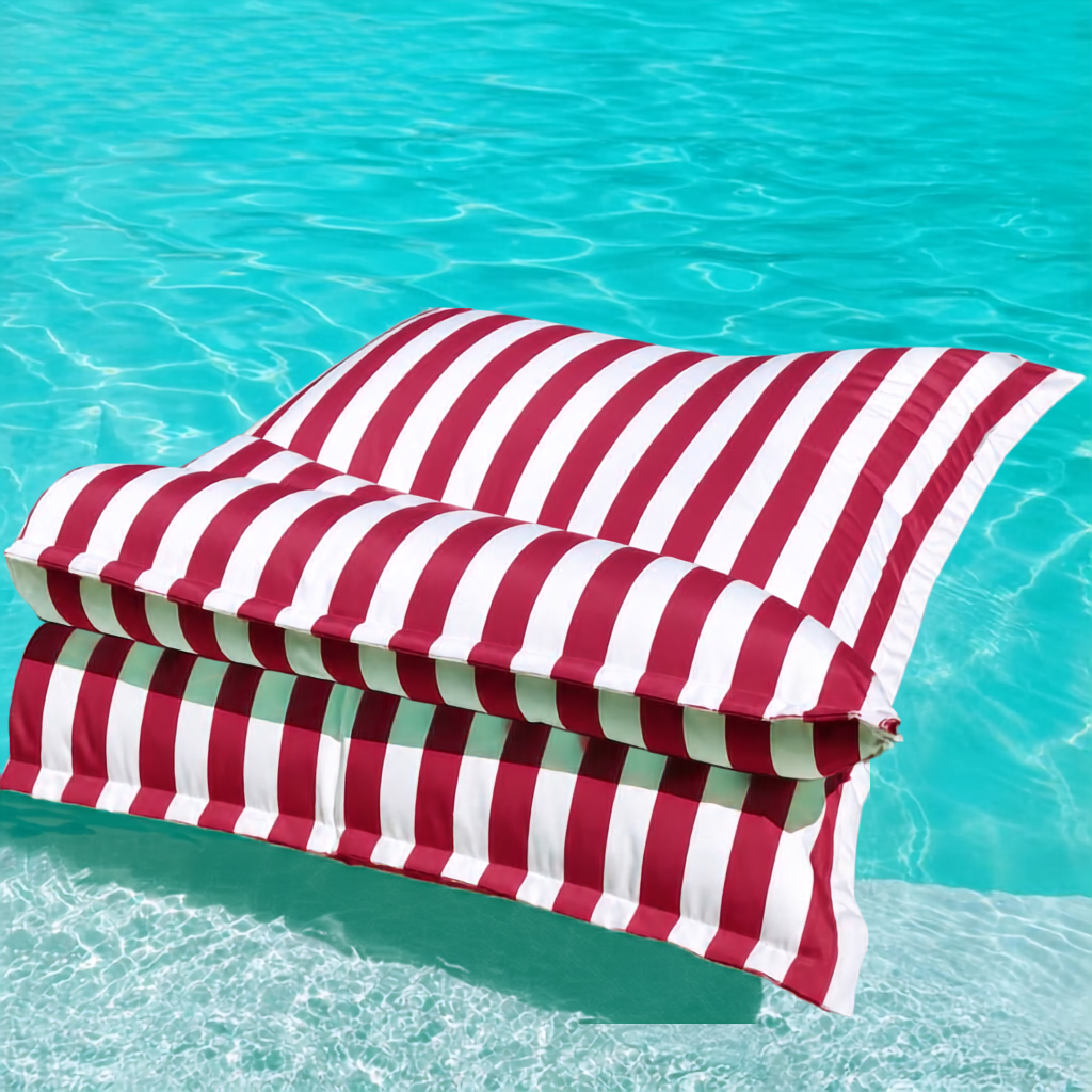 White and red striped Big Bertha Premium Double  floating beanbag lounger cover in a swimming pool, 140 x 180 cm.