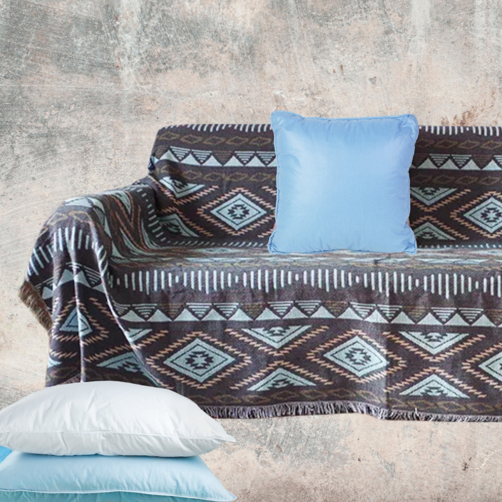 Reversible view of the Coastal Picnic Rug in the Desert Diamond pattern, showing both sides of the jacquard woven cotton design with tassel edging.