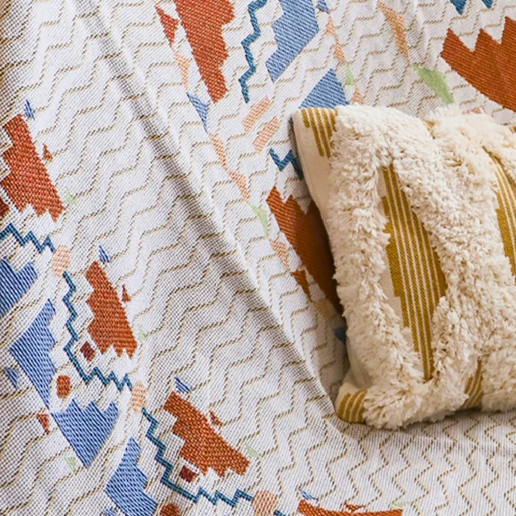 Close-up of the Coastal Picnic Rug showing the Scandi Woven jacquard pattern 
