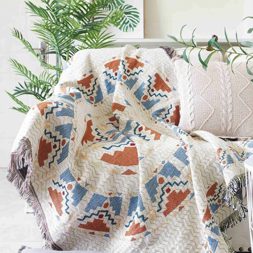 Coastal Picnic Rug in the Scandi Woven pattern, jacquard-woven cotton with tassel edging, shown laid out for outdoor indoor use.