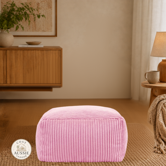Cosy Cloud Corduroy Indoor Footstool Cover Pink in a cosy indoor living room with soft ribbed corduroy fabric