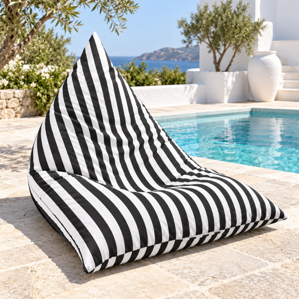 Hamptons Outdoor Beanbag Cover 100x140 in black and white vertical stripe displayed poolside

