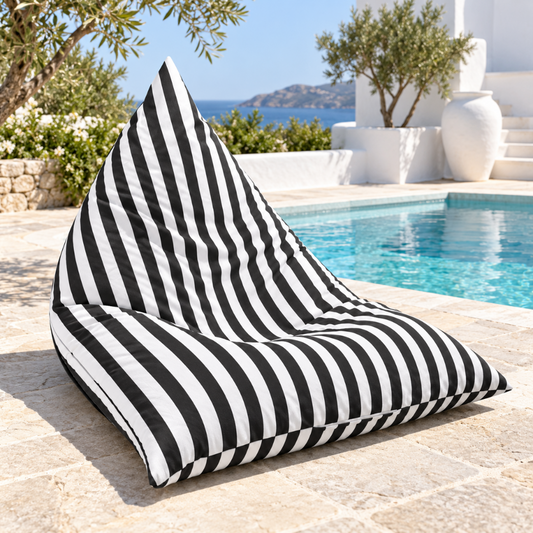 Hamptons Outdoor Beanbag Cover 100x140 in black and white vertical stripe displayed poolside

