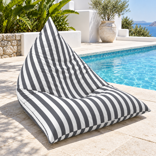 Hamptons Outdoor Beanbag Cover 100x140 in dark grey and white vertical stripe displayed poolside
