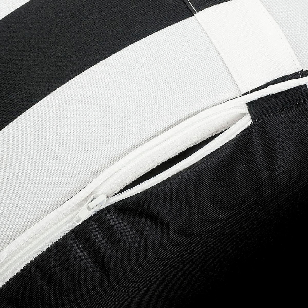 Close-up of zippered black and white stripe outdoor inflatable ottoman cover and black PVC inner.