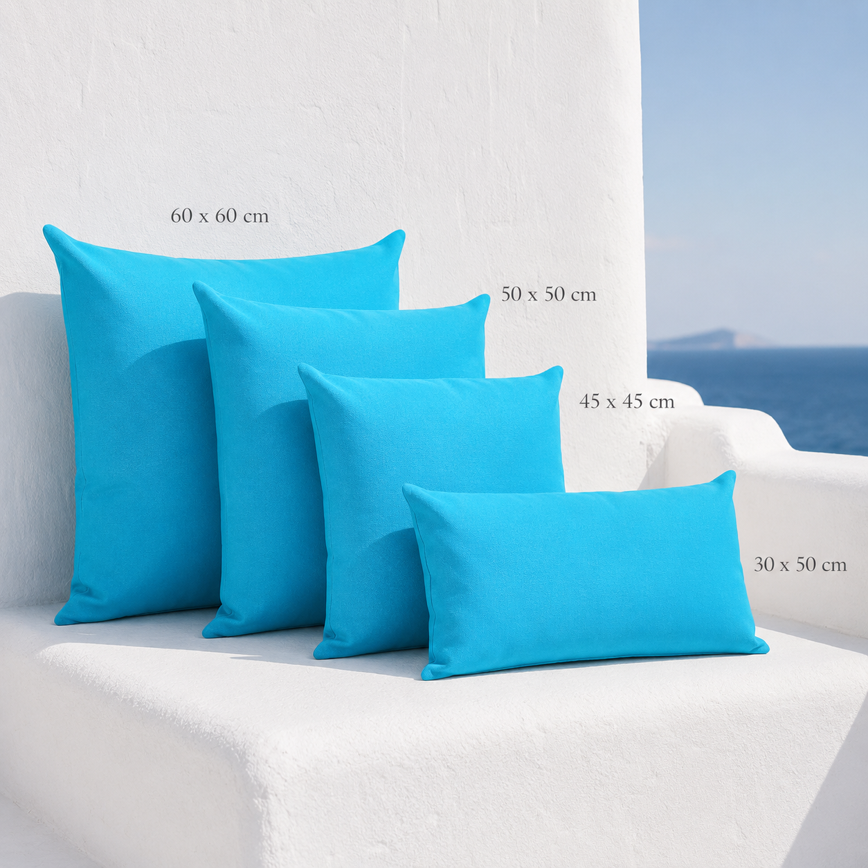 Santorini blue weatherproof outdoor cushion covers in 30 x 50 cm, 45 x 45 cm, 50 x 50 cm and 60 x 60 cm sizes.
