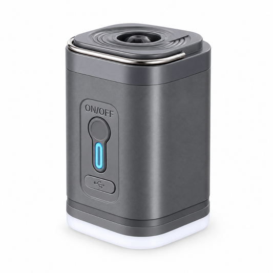Grey USB rechargeable electric air pump for quickly inflating and deflating outdoor inflatable ottomans.